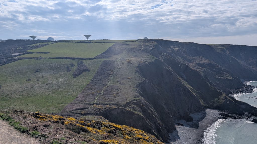 The descent into Stanbury Mouth with GCHQ Bude ahead