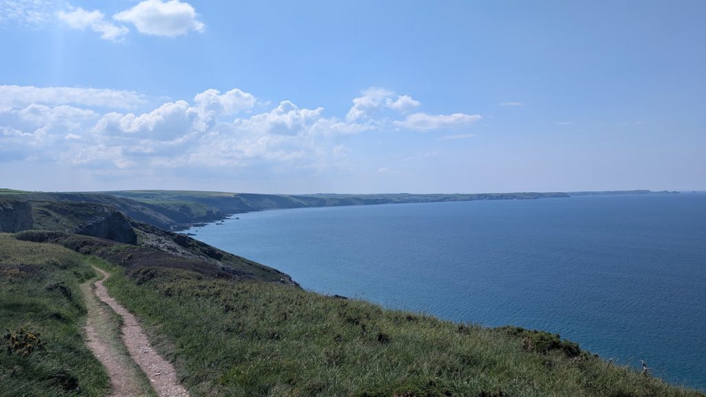 Walking along the top of Treligga Cliffs towards Tregonnick Tail with 'The Mountain' in view
