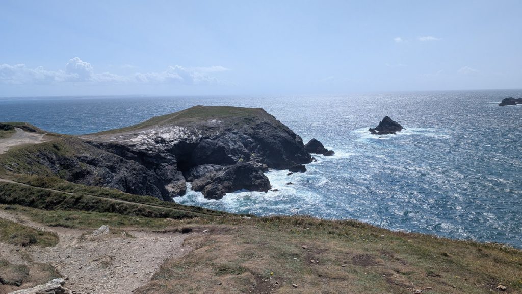 Looking across Stinking Cove towards Dinas Head