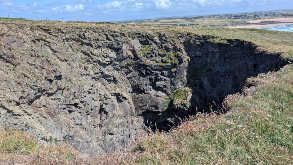 Round Hole- a blow hole formed when a sea cave collapsed