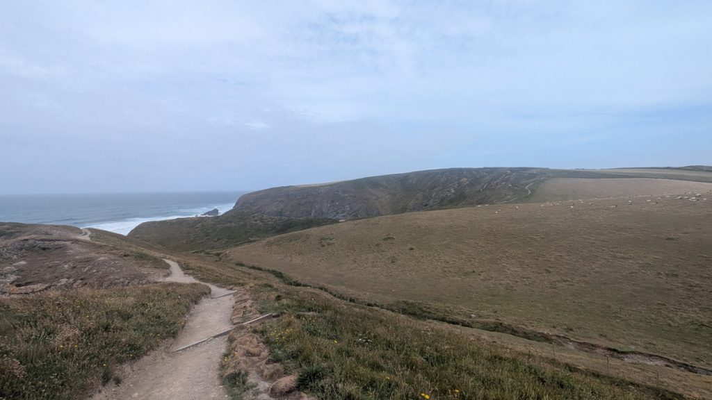 Another view looking back at Beacon Cove ahead and Griffin Point & its Iron Age Fort to the left