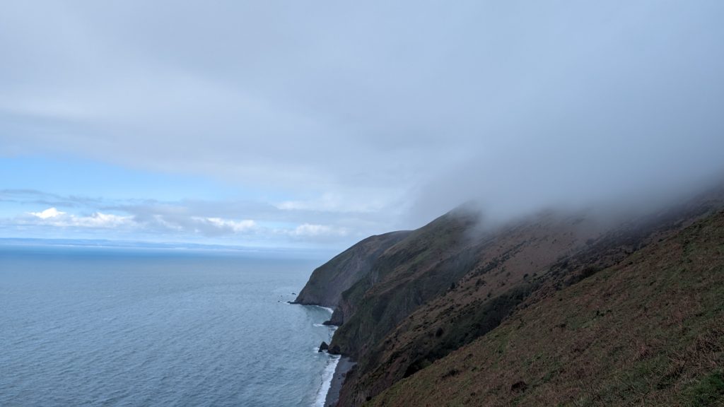 Looking back across the steep slopes of Butter Hill and The Foreland to Foreland Point