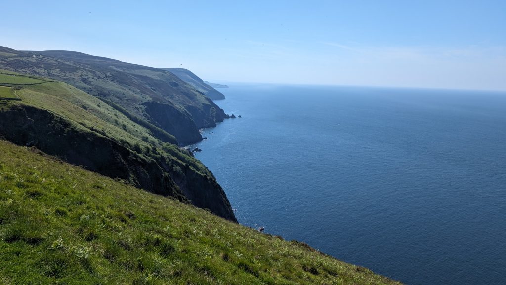 The Great Hangman in the distance. The Mare and calf below jutting into the bay