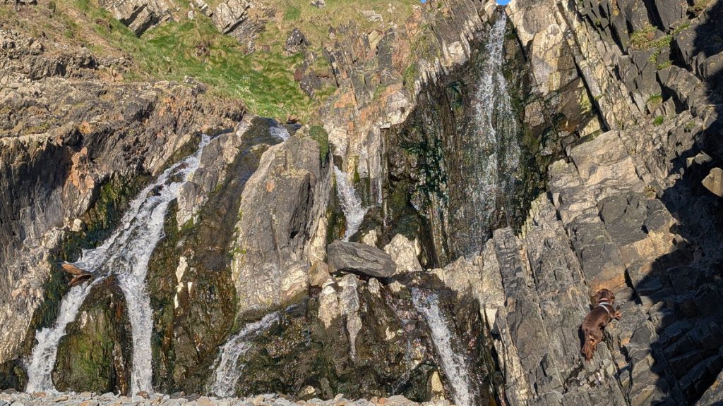 The Welcombe Mouth Waterfall from the beach