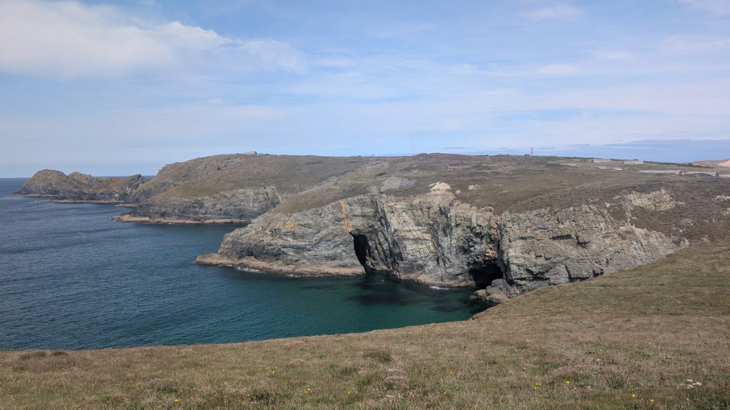 Mine Shaft above
the Cave or Tunnel with the Elvan Dyke in the headland opposite.