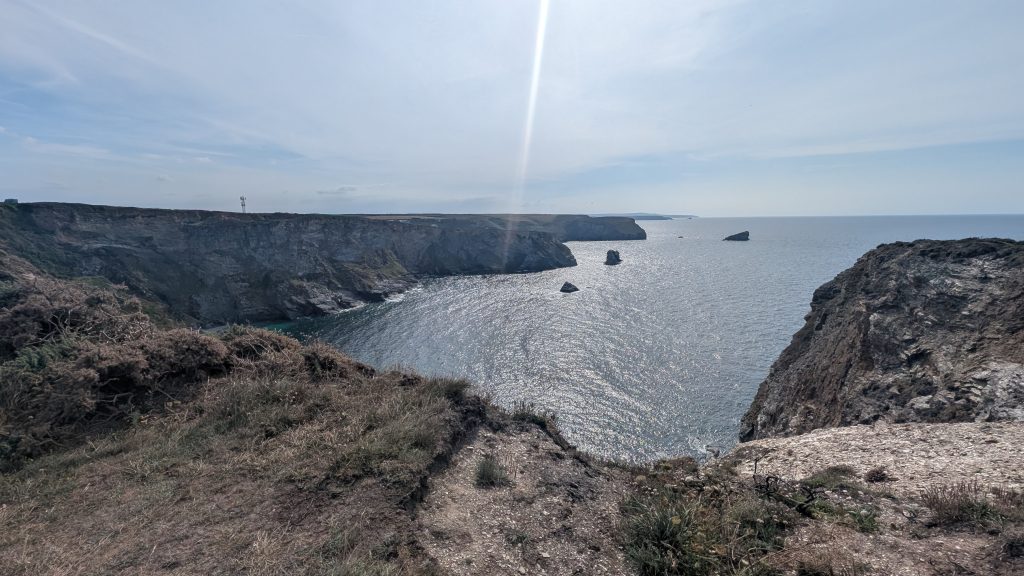 In the distance, Western Hill marks the headland of Portreath Beach, with Gull Rock furthest away, followed by Horse Rock, and Gooden Heane Rock the closest.