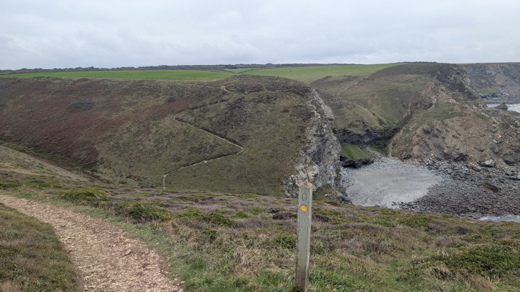 Dropping down into the combe by Porth-cadjack Cove